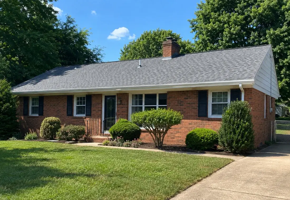 Farmhouse-style home with a wraparound porch and new roof